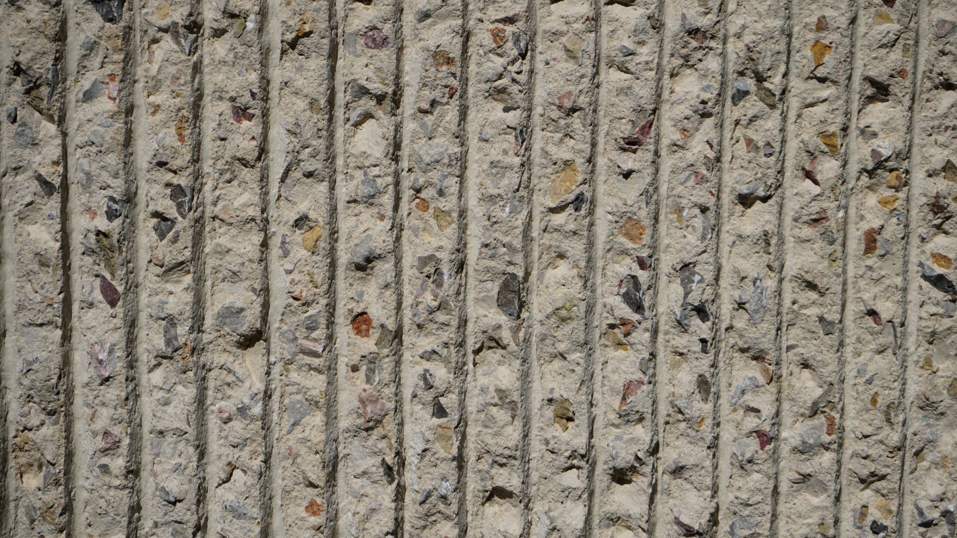 Bush-hammered rib in concrete.JPG